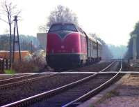 DB <I>'Warship'</I> class no 220 005 heads north at Hemsen between Rheine and Emden with a stopping train in April 1976.<br><br>[John McIntyre /04/1976]