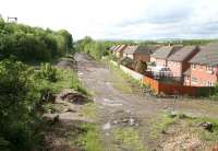 Site of the new station at Newtongrange looking south from the A7 road bridge on 9 June 2012. The headgear of Lady Victoria Colliery can just be seen poking above the trees on the left. [See image 13785]<br><br>[John Furnevel 09/06/2012]