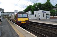 Dalmuir's new station building viewed from the westbound platform of the Singer line. The station is still not quite portacabin free as the BTP have a building on the eastbound Singer line platform.<br><br>[Ewan Crawford 12/06/2012]