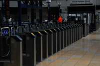 Sadly the days of strolling along the Queen Street's platforms on a flying visit are over due to this long rank of barriers<br><br>[Ewan Crawford 12/06/2012]