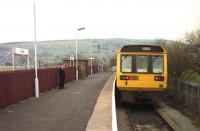 142015 and guard wait to return west to Blackpool South from the terminus at Colne on 31 March 1992. Once a busy through station to Skipton, the Colne to Skipton section was closed in 1970. Today there is a proposal to reopen this section with Skipton East Lancashire Railway Action Partnership (SELRAP) being the group behind the scheme.<br><br>[John McIntyre 31/03/1992]