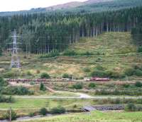 EWS 66009 climbing Beattock Bank at Greskine in September 2007 with an engineer's train.<br><br>[John Furnevel 12/09/2007]