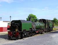 Beyer-Garratt 143 gets ready for a day's work on the Welsh Highland Railway at Dinas in May 2012.<br><br>[Peter Todd 14/06/2012]