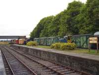 Looking south-west from the Up platform at Bridge of Dun in August 1992. The track curves to the right at the end of the platform heading to Brechin. 26 years earlier the main line to Forfar and Perth would have been in place with Gresley A4s thundering through on the 3 hour expresses between Glasgow and Aberdeen. [See image 6886]<br><br>[John McIntyre 09/08/1992]