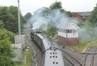 Another Poulton view that will change with the forthcoming Blackpool electrification. Green Duchess 46233 passes the junction for Fleetwood as it heads for Blackpool North with the <I>Fylde Coast Express</I> from Sheffield on a wet and windy June day.<br><br>[Mark Bartlett 16/06/2012]