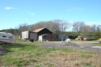 The still complete goods shed at Fort George Station in Ardersier, some 53 years after complete closure of the branch [see image 5171].<br><br>[Graham Morgan 14/04/2012]