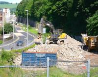 View north from Station Brae road bridge in Galashiels on 18 June 2012. The flats which had impeded the planned Borders Railway route have been demolished and clearance of the trackbed is now underway. The new station will be located just beyond the rubble. [See image 28730]<br><br>[John Furnevel 18/06/2012]