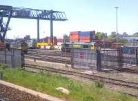 I used to have a dilemma when approaching New Street from the East: do I look at Saltley depot, or Landor Street? The demolition of Saltley has made life simpler. Freightliner locomotives 66534 'OOCL Express' and 66537 rest up between duties on 26 May 2012.<br><br>[Ken Strachan 26/05/2012]