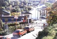 Traffic queue at the level crossing at East Farleigh, Kent, in August 1994.<br><br>[Ian Dinmore /08/1994]