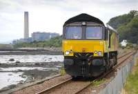 Colas Rail 66847 nears Culross with a route learning trip from Stirling to Townhill on 25 June, with Longannet Power Station in the background. There has been speculation that the Linkswood aviation fuel trains may be diverted this way - while they last.<br><br>[Bill Roberton 25/06/2012]