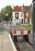 It looks as if the Barton on Humber branch once continued beyond the station, or was planned to, but as far as I'm aware it never did. View past the cab of the newly arrived <I>bubble car</I> to the buffer stops. A basic two-hourly shuttle operates from here to Grimsby and Cleethorpes. This journey takes just under fifty minutes, which allows the single unit to maintain services.<br><br>[Mark Bartlett 21/05/2012]