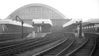 Looking back along the platforms at Manchester Central in May 1969. Just visible through the gloom is the DMU forming the <I>'Manchester Terminals Farewell Railtour'</I> awaiting its departure time. [See image 31031]<br><br>[K A Gray 03/05/1969]