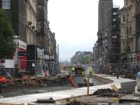 Looking along Shandwick Place towards Haymarket from the end of Princes Street on 22 June 2012, with concrete casting continuing west for the in bound tram track. <br><br>[David Pesterfield 22/06/2012]