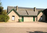 The booking office and passenger entrance to the original Portsoy terminus looking east on 23 May 2012, approximately 128 years after the last ticket was issued.  The north end of the former train shed stands in the background. Just off to the right is Old Station Yard, now a council depot and recycling point. [See image 39216]<br><br>[John Furnevel 23/05/2012]