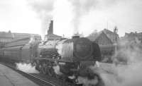 Stanier Pacific no 46237 <I>City of Bristol</I> calls at Stirling on an overcast March day in 1964 with the 10.10 Euston - Perth.<br><br>[K A Gray 28/03/1964]