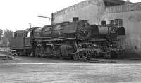 Two oil fired 3 cylinder 2-10-0s, Nos, 043 737 and 043 087, in repose adjacent to the roundhouse at Rheine in September 1974. Pre-computerisation these had been numbered 44 1737 and 44 087 respectively but in 1968 the opportunity was taken to differentiate between oil and coal-fired locos and the former became class 043, the latter class 044. Both locos survived in service until the end of steam at Rheine in October 1977.<br><br>[Bill Jamieson 07/09/1974]