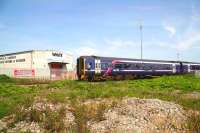 The 10.14 Aberdeen - Inverness service arrives at Forres on 22 May 2012 to much waving and cheering. [See image 38979]<br><br>[John Furnevel 22/05/2012]