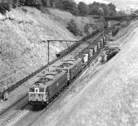 76032+76034 lift a load of coal for Fiddler's Ferry Power Station up the Don Valley between Ecklands and Hazlehead on the climb to Woodhead Tunnel. The date is thought to be 16 July 1981 and the train 6M31, the 16.30 departure from Barnsley Junction, Penistone.<br><br>[Bill Jamieson 16/07/1981]