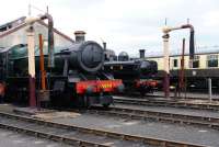 Scene in the yard at Didcot on 28 June with 4-6-0 6998 <I>Burton Agnes Hall</I> nearest the camera and 0-6-0PT 3738 beyond.<br><br>[Peter Todd 28/06/2012]