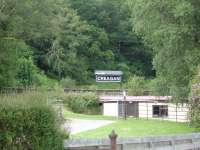 Running in board at the west end of the platform at the former Creagan station on the Ballachulish branch in June 2012. Photographed from the adjacent A828 road just after the former rail, now road, bridge over Loch Creran. <br><br>[David Pesterfield 19/06/2012]