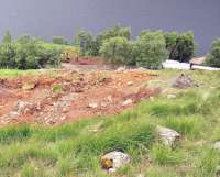 The site of the landslip near Tulloch which led to the derailment on 28 June. View on 4 July looking down towards the railway with Loch Trieg beyond. Almost all of the dislodged spoil has been cleared away by this stage.<br><br>[John Gray 04/07/2012]