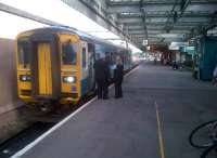 Come the revolution, brother, those 153's will be first up against the wall. The 18.25 to Crewe prepares to leave town on 20 June 2012. The bicycle on the right appears to be embracing tilt technology.<br><br>[Ken Strachan 20/06/2012]