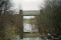 View looking away from the terminus at Catrine in 1997. The terminus has been landscaped and partly built on, this overbridge is the nearest substantial structure remaining.<br><br>[Ewan Crawford /04/1997]