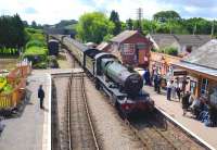 7828 'Norton Manor', newly named to commemorate the Royal Marines of 40 Commando, photographed at Williton on the West Somerset Railway on 11 July 2012.<br><br>[Peter Todd 11/07/2012]