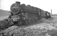 Stored locomotive line at Llandudno Junction in April 1963, with Black 5 no 44686 at the head of the queue.<br><br>[K A Gray 01/04/1963]