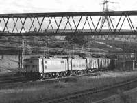 On a fine July evening in 1981 nos 76031+76035 pass Dunford Bridge signal box with the Manchester to Harwich Parkeston Quay ferry vans, having just emerged from Woodhead Tunnel. Both locomotives were withdrawn later that month. <br><br>[Bill Jamieson 16/07/1981]