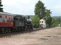 Ivatt 2MT 2-6-0 46512 leaves Boat of Garten heading for Broomhill with the third and last train of the day on 5th July 2012. <br><br>[Mark Bartlett 05/07/2012]