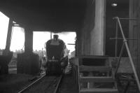 A4 no 4498 <I>'Sir Nigel Gresley'</I> moves slowly into position under the coaling plant at Carnforth shed in 1968.<br><br>[David Spaven //1968]