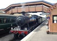 GWR Collett 2-8-0 No 3850 about to take a train away from Williton Station on the West Somerset Railway on 11 July 2012, destination Bishops Lydeard.<br><br>[Peter Todd 11/07/2012]