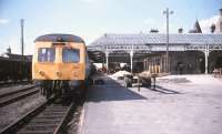 A DMU stabled alongside platform 1 at Elgin East in 1979, some 11 years after the station had closed to scheduled passenger services.<br><br>[Ian Dinmore //1979]