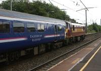 Following delays affecting the southbound Aberdeen portion of the previous nights Highland Sleeper, 90035 is seen heading south through Leyland at just after 2 pm on 14 July 2012.<br><br>[John McIntyre 14/07/2012]