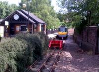 This is the rather pleasant modern station at Stourbridge Town, seen from the adjacent bus station. The two-strong class 139 is possibly the only class of British railway traction to have all members photographed on RAILSCOT [see image 34453 for the other one].<br><br>[Ken Strachan 08/07/2012]