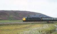 40157 heads a southbound passenger train at Etteridge, north of Dalwhinnie, in the summer of 1980. [With thanks to Kenny McRae, Crinan Dunbar and Jim Rafferty]<br><br>[Peter Todd 25/08/1980]