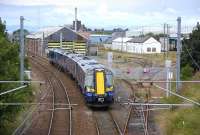 380 111 heading south past the closed Ayr MPD in July 2012 on the approach to Ayr station [see image 5610]. <br><br>[Bill Roberton 19/07/2012]