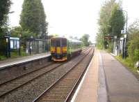 An unusually green view of Bedworth in July 2012, as the 18.53 Coventry - Nuneaton continues its journey north. The hourly passenger service on this line is supplemented by lots of heavy freight [see image 35643], which doesn't take kindly to frequent stops - hence the failure of proposals to provide a tram service on the line.<br>
Despite the empty appearance of the station in this shot, ORR statistics show a 45% increase in usage in the last year - up to 1,000 passengers per week.<br><br>[Ken Strachan 05/07/2012]