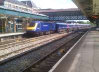 As if in a time warp - only the yellow platform barrier just visible on the right shows that the 10.31 to Swansea is approaching its stopping point, rather than being there already, as Newport station has been effectively moved West following its recent rebuild. The rear power car has just passed the former rail-over-rail bridge [see image 39372].<br><br>[Ken Strachan 20/06/2012]