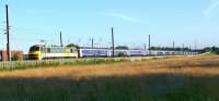 The southbound Lowland Sleeper with 90036 in charge photographed passing Farington Junction just before 7am on 21 July 2012. The train was running more than 2 hours behind schedule at this point.<br><br>[John McIntyre 21/07/2012]