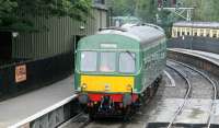 A DMU arrives empty stock through the rain at Pickering station on 7 July 2012 to form the 14.00 train to Grosmont.<br><br>[John Furnevel 07/07/2012]