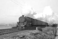 Ardrossan Black 5 no 45251 heads south with the Largs branch daily goods in 1962. The train has just passed through West Kilbride, part of which can be seen in the left background. [With thanks to Messrs Martin, Armit and Prescott] <br><br>[R Sillitto/A Renfrew Collection (Courtesy Bruce McCartney) //1962]