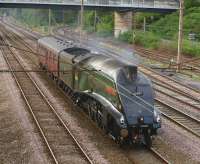 A4 no 60009 <I>Union of South Africa</I>, which had appeared earlier on 23 July with the Compass Tours 'Mersey Moorlander', seen running past Farington Junction with support coach on its way back to Crewe. <br><br>[John McIntyre 23/07/2012]