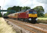 Recently overhauled and returned to service, WCRC 57006 has now been repainted from Advenza Freight blue into WCRC house colours. On 28 July 2012 it was used with 57601 to haul the 'Lakeland Statesman' from Kettering to Ravenglass, seen here on the return heading south on the WCML approaching Brock. [See image 40157]<br><br>[John McIntyre 28/07/2012]