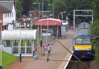 All aboard the 10.53 to Airdrie on a grey Monday morning at Balloch on 30 July 2012.<br><br>[Andrew Wilson 30/07/2012]