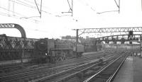 Looking south across the Clyde from Glasgow Central station in July 1966 as Britannia Pacific no 70002 <I>Geoffrey Chaucer</I> backs out of the platform and prepares to head for Polmadie shed.<br><br>[K A Gray 30/07/1966]