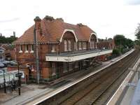 Part time staffed Shenstone station in Staffordshire, looking south from the adjacent road over-bridge in July 2012. The station is located on the Birmingham cross-city line linking Redditch and Lichfield via New Street.<br><br>[David Pesterfield 31/07/2012]