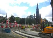 View along the curve of the tram route from St Andrew Square to Princes Street on 3 August, with signs of the 2012 Festival starting to appear.<br><br>[F Furnevel 03/08/2012]