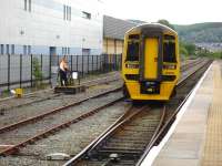 Reserve set 158836 crosses over from the stabling siding onto the platform line at Aberystwyth before returning ECS to Machynlleth depot on 30 May  following the departure of the 09.30 service train. A reserve set is sent out to Aberystwyth to ensure a 09.30 departure in the event of delays with the incoming working. [See image 39812]  <br><br>[David Pesterfield 30/05/2012]